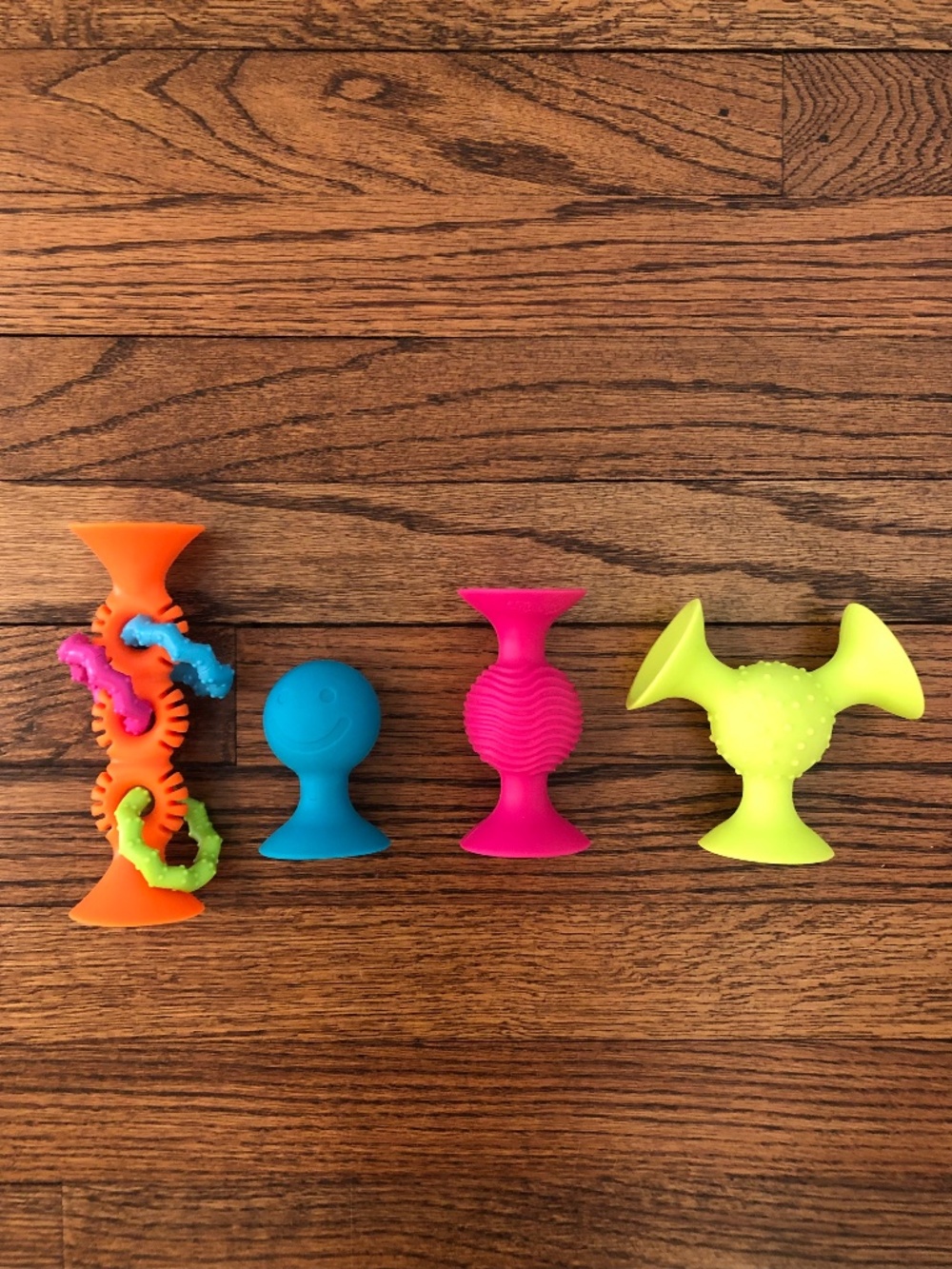 pipSquigz Suction Toys by Fat Brain Toys, 4 piece lot, Rattles and Loop